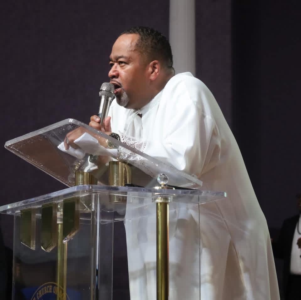 Dr. Brown preaching from the pulpit